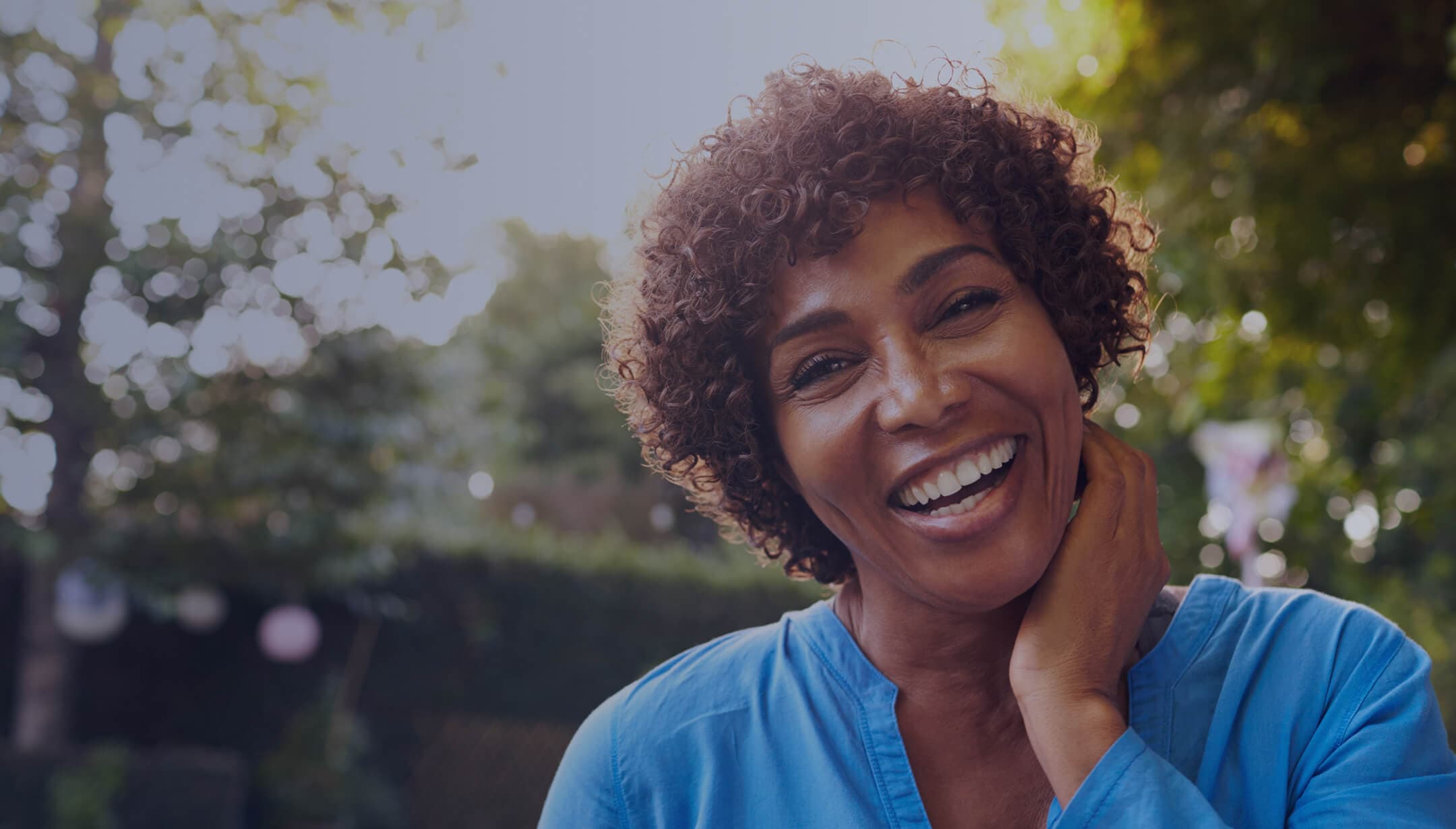 An active mature woman, strength training