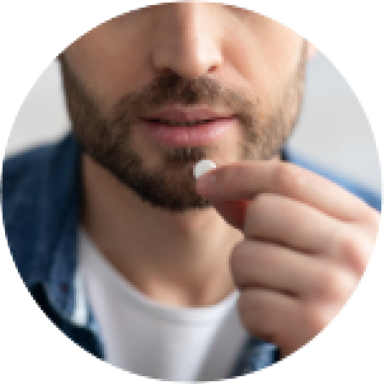 Man Taking Supplement